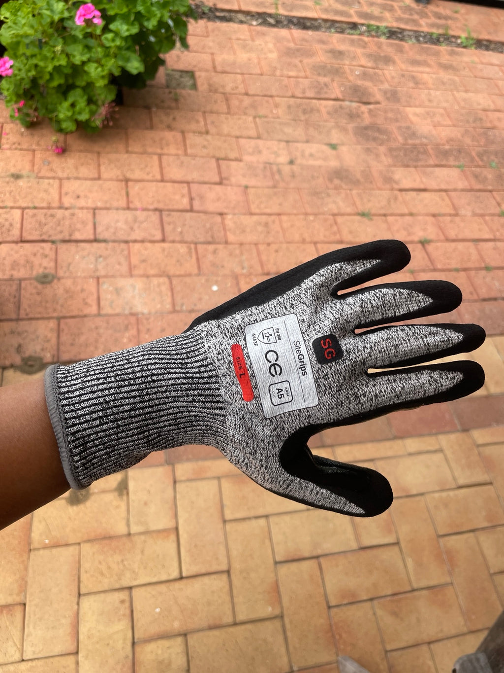 Side view of the palm and fingers of a SiteGrips work glove.