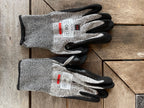 Two SiteGrips work gloves shown palm up with black grip coating.