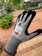 Angled close-up of the back and wrist cuff of a SiteGrips work glove.